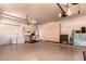 Spacious garage with built-in cabinets, ample storage, and well-lit workspace at 1811 S Brentwood Pl, Chandler, AZ 85286