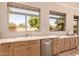 Bright kitchen featuring stainless steel appliances and an ample countertop at 1811 S Brentwood Pl, Chandler, AZ 85286