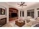 Comfortable living room features built-in entertainment center and fireplace at 1811 S Brentwood Pl, Chandler, AZ 85286