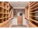 Walk-in closet with extensive shelving and drawers, maximizing storage space at 1811 S Brentwood Pl, Chandler, AZ 85286
