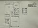 Detailed floor plan showing a three-bedroom layout, open living space, and an attached two-car garage at 18244 W Soft Wind Dr, Surprise, AZ 85387