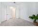 A carpeted bedroom featuring french doors and natural light at 18453 W Elwood St, Goodyear, AZ 85338