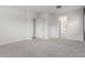 Bright bedroom with plush carpeting and neutral wall color at 18453 W Elwood St, Goodyear, AZ 85338