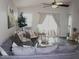 Bright living room with comfortable seating, natural light and view of the backyard at 18599 W Illini St, Goodyear, AZ 85338