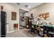 Spacious room with dual work areas plus an attached laundry area, convenient for multi-tasking and chores at 18653 W Mescal St, Surprise, AZ 85388