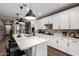 Spacious kitchen with a large island, stainless steel appliances, and lots of storage at 18653 W Mescal St, Surprise, AZ 85388