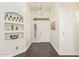 Welcoming foyer featuring dark wood floors and a decorative lighting fixture at 19606 N 23Rd Way, Phoenix, AZ 85024