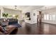 Spacious living room with hardwood floors and a modern fireplace at 19606 N 23Rd Way, Phoenix, AZ 85024