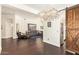 Open floor plan featuring hardwood floors and an elegant chandelier at 19606 N 23Rd Way, Phoenix, AZ 85024