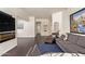 Bright living room featuring hardwood floors, modern fireplace, and neutral decor at 19606 N 23Rd Way, Phoenix, AZ 85024