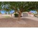 Charming single-story home featuring a well-manicured front yard and a neutral paint scheme at 2027 S Rowen St, Mesa, AZ 85209