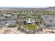 This aerial view showcases a new Primary-planned community with neighborhood amenities at 20421 W Legend Trl, Buckeye, AZ 85396