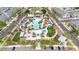 This aerial view captures the resort-style community pool with lush landscaping at 20421 W Legend Trl, Buckeye, AZ 85396