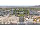 This aerial view displays the community's landscaping, new construction, and Gathering-friendly park at 20421 W Legend Trl, Buckeye, AZ 85396