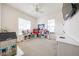 Bright bedroom with neutral carpet, plenty of natural light, and ample space for play at 20421 W Legend Trl, Buckeye, AZ 85396