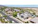 This exterior elevation showcases a Southwestern home with solar panels and desert landscaping at 20421 W Legend Trl, Buckeye, AZ 85396