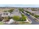 Neighborhood street showcasing well-kept homes, mature trees, and a peaceful residential atmosphere at 20421 W Legend Trl, Buckeye, AZ 85396