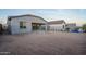 The backyard has a covered patio and is ready for customization and landscaping at 20961 W Pasadena Ave, Buckeye, AZ 85396