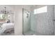 Spa-like bathroom with walk-in shower, modern tile, and luxurious fixtures at 20961 W Pasadena Ave, Buckeye, AZ 85396