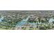 Aerial view of Fulton Ranch showcasing beautiful homes, lakes, green spaces, and community amenities at 211 W New Dawn Dr, Chandler, AZ 85248