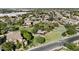 Aerial view of the Fulton Ranch community highlighting lush landscaping, homes, and a park at 211 W New Dawn Dr, Chandler, AZ 85248