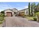 Attractive single-story home with a three car garage and paver driveway at 211 W New Dawn Dr, Chandler, AZ 85248
