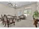 Formal living room featuring elegant furnishings and a decorative chandelier at 211 W New Dawn Dr, Chandler, AZ 85248