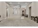 Open-concept living space with tiled floors and ample natural light at 211 W New Dawn Dr, Chandler, AZ 85248