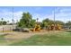 Community playground with swings and slides provide recreational space for children and families at 211 W New Dawn Dr, Chandler, AZ 85248