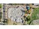 Aerial view of the modern skate park in Fulton Ranch's community park; playground nearby at 211 W New Dawn Dr, Chandler, AZ 85248