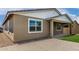 View of the home's exterior showcasing manicured landscaping at 22568 E Rosa Rd, Queen Creek, AZ 85142