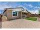 Exterior shot of backyard featuring both gravel and artificial turf at 22568 E Rosa Rd, Queen Creek, AZ 85142