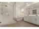 Spa-like bathroom features walk-in shower, soaking tub and dual vanities at 22568 E Rosa Rd, Queen Creek, AZ 85142
