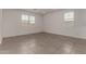 Spacious bedroom features tile floors and plantation shutters on windows at 22568 E Rosa Rd, Queen Creek, AZ 85142