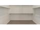 Walk-in closet featuring multiple shelves and rods, perfect for organization at 22568 E Rosa Rd, Queen Creek, AZ 85142
