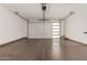 Garage view showcasing the door with a large window panel at 22568 E Rosa Rd, Queen Creek, AZ 85142