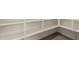 Bright pantry featuring shelving, storage and neutral color palette at 22568 E Rosa Rd, Queen Creek, AZ 85142