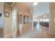 Entryway featuring tile flooring, with views of the living area and a charming hutch at 2395 E Hancock Trl, Casa Grande, AZ 85194