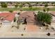 A cozy home with a two car garage, desert landscaping, and a beautiful roof in a great community at 2395 E Hancock Trl, Casa Grande, AZ 85194