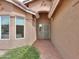 Inviting front entry with tile flooring and views of the exterior at 2395 E Hancock Trl, Casa Grande, AZ 85194