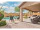 Inviting backyard with a pool, patio, and lush landscaping, perfect for outdoor entertaining at 28136 N 90Th Ln, Peoria, AZ 85383
