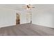 Spacious bedroom with ceiling fan, neutral carpeting and ensuite access at 40427 N Orkney Way, San Tan Valley, AZ 85140