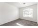 Carpeted room showcasing a large window and lots of natural light at 40427 N Orkney Way, San Tan Valley, AZ 85140