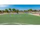 Community basketball court surrounded by trees and landscaping at 4771 E Meadow Land Dr, San Tan Valley, AZ 85140