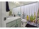 Well-lit bathroom with decorative shower curtain and neutral countertop vanity at 4771 E Meadow Land Dr, San Tan Valley, AZ 85140