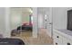 Bright bedroom featuring mirror closet doors and neutral carpet, offering a cozy and functional space at 4771 E Meadow Land Dr, San Tan Valley, AZ 85140