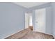 This bedroom features tan carpet, blue walls and white trim at 701 S 92Nd St, Mesa, AZ 85208