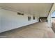 This long covered patio has an enclosed wall at the end at 701 S 92Nd St, Mesa, AZ 85208