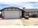Charming single-Gathering home featuring a 2-car garage and a well-maintained front yard at 7013 W North Ln, Peoria, AZ 85345