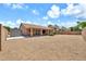 Large backyard with a block wall fence at 7214 W Crest Ln, Glendale, AZ 85310